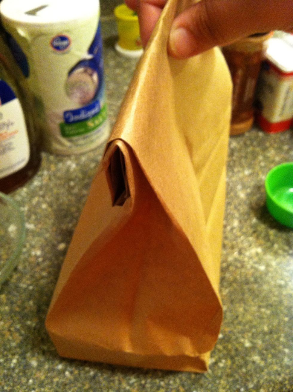 Fold up your bag about 3 folds, crease it and set it aside.