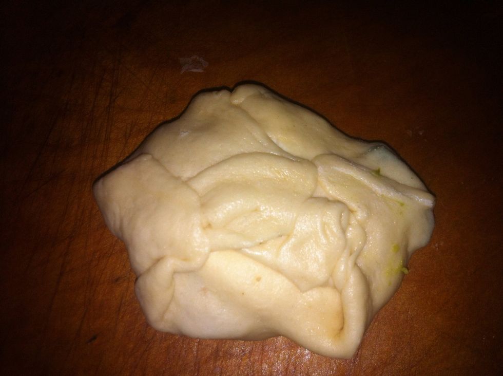 Fold up your crescent roll. Pinch your seams together and then flatten with your hand like a hamburger party.