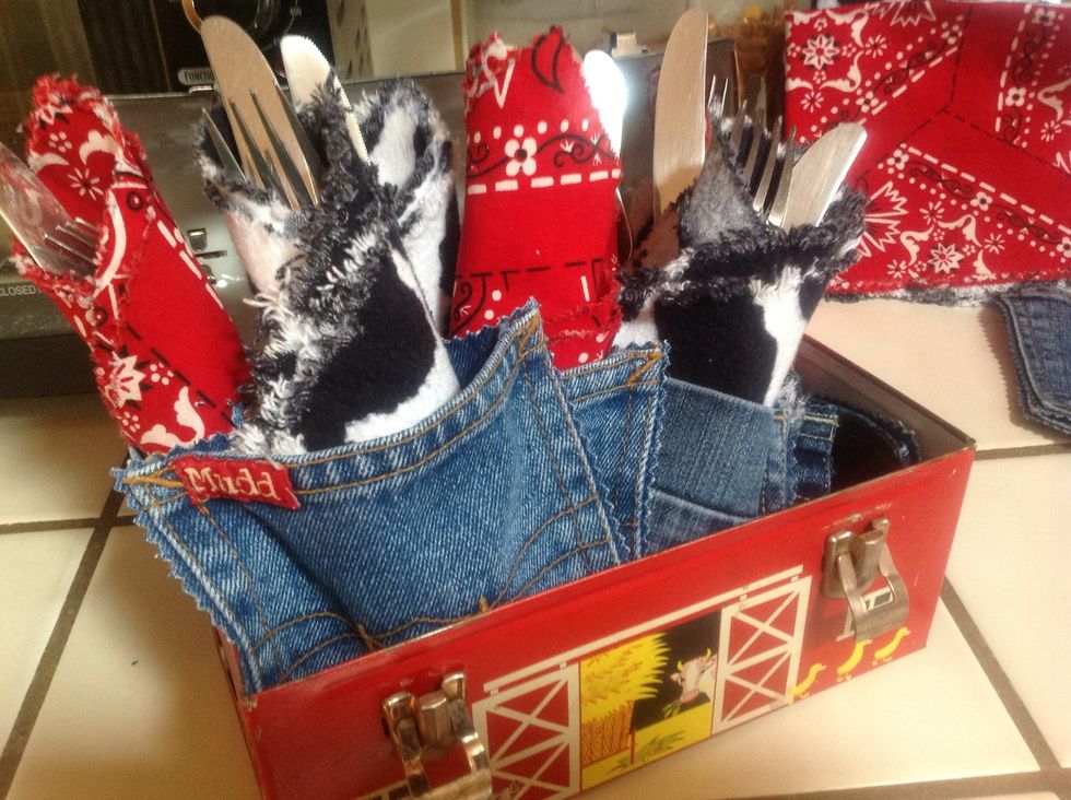 Fold up your utensils in a cloth napkin and stick inside the denim pocket. Easy to grab and go.