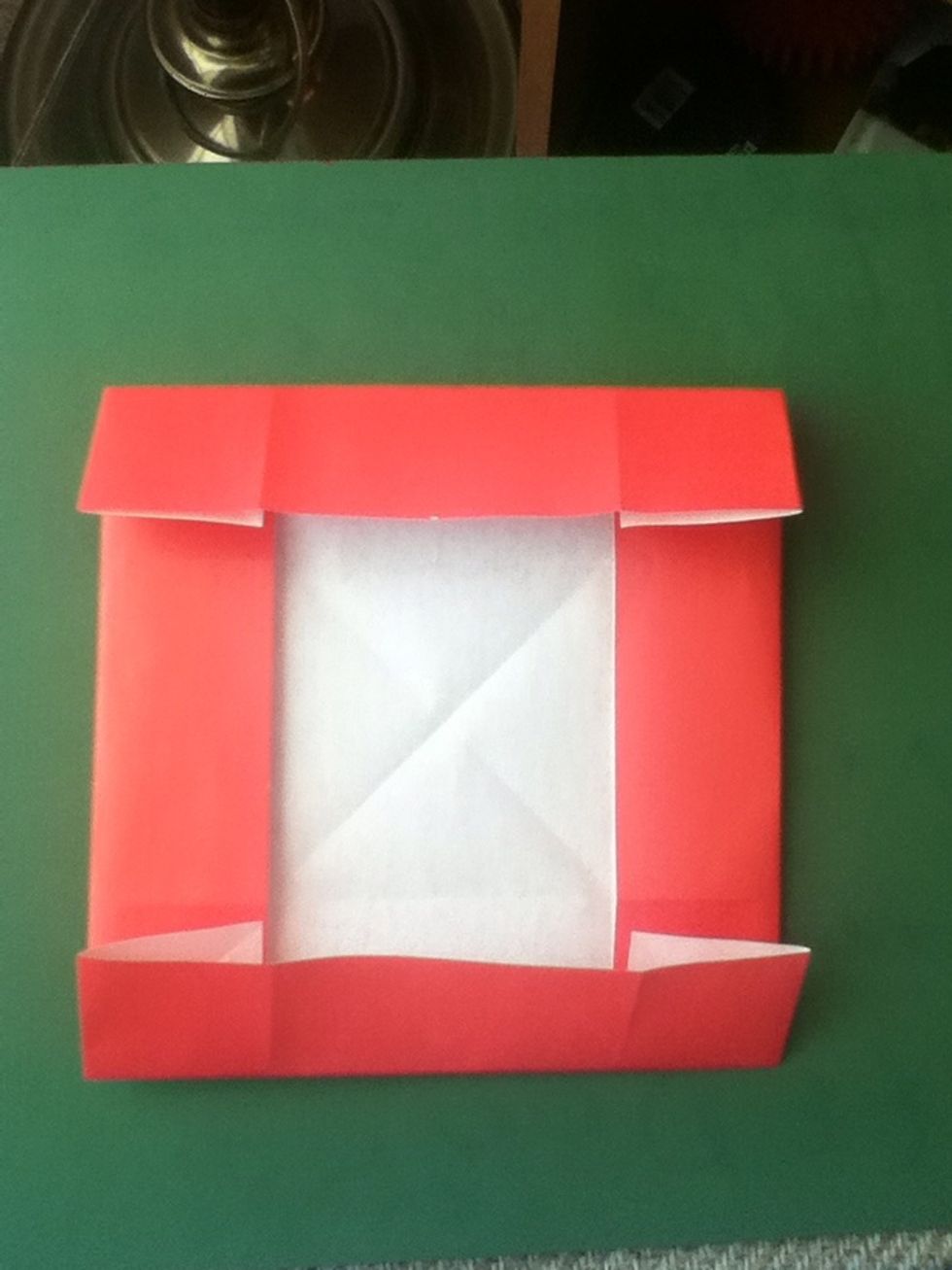 Fold upper and lower edges to first horizontal crease