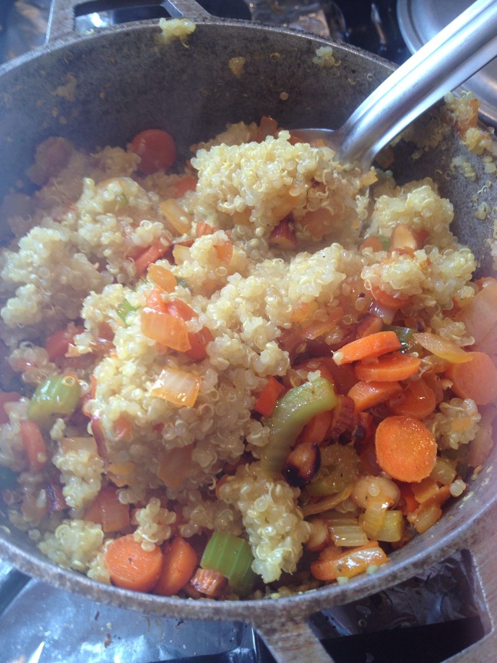 Fold veggies in quinoa