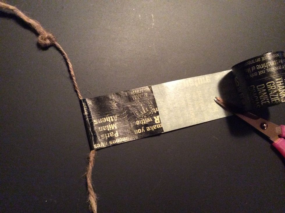 Fold washi tape over jute.