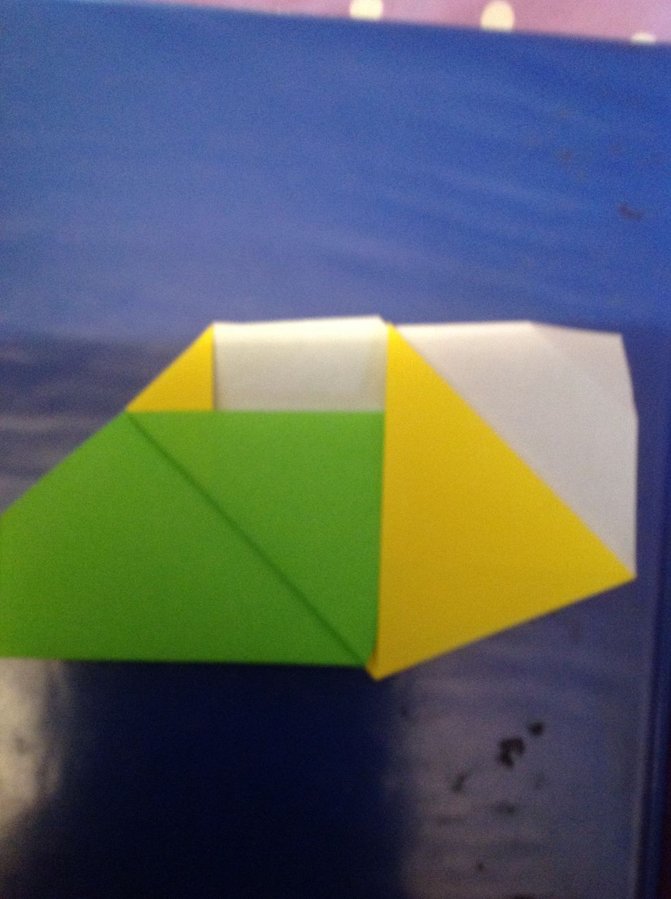 Fold yellow tip into green fold