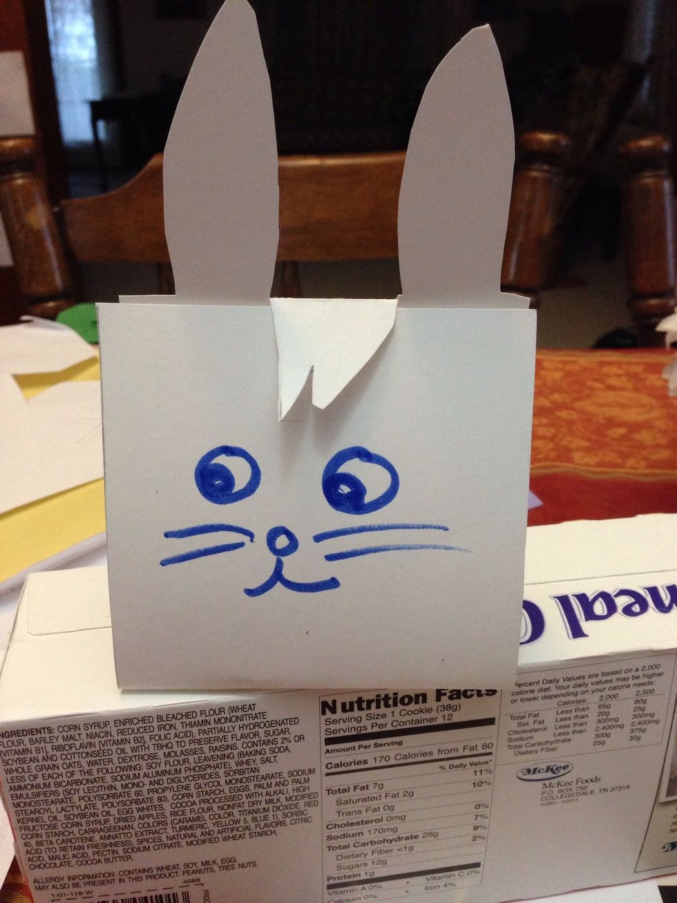 Fold your bunny up and fold over his little hair, and you have your little bunny!!! You can put whatever you want in him and you get a great way to wrap your easter candy!