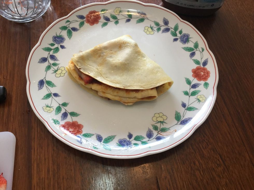Fold your crepe in half again.