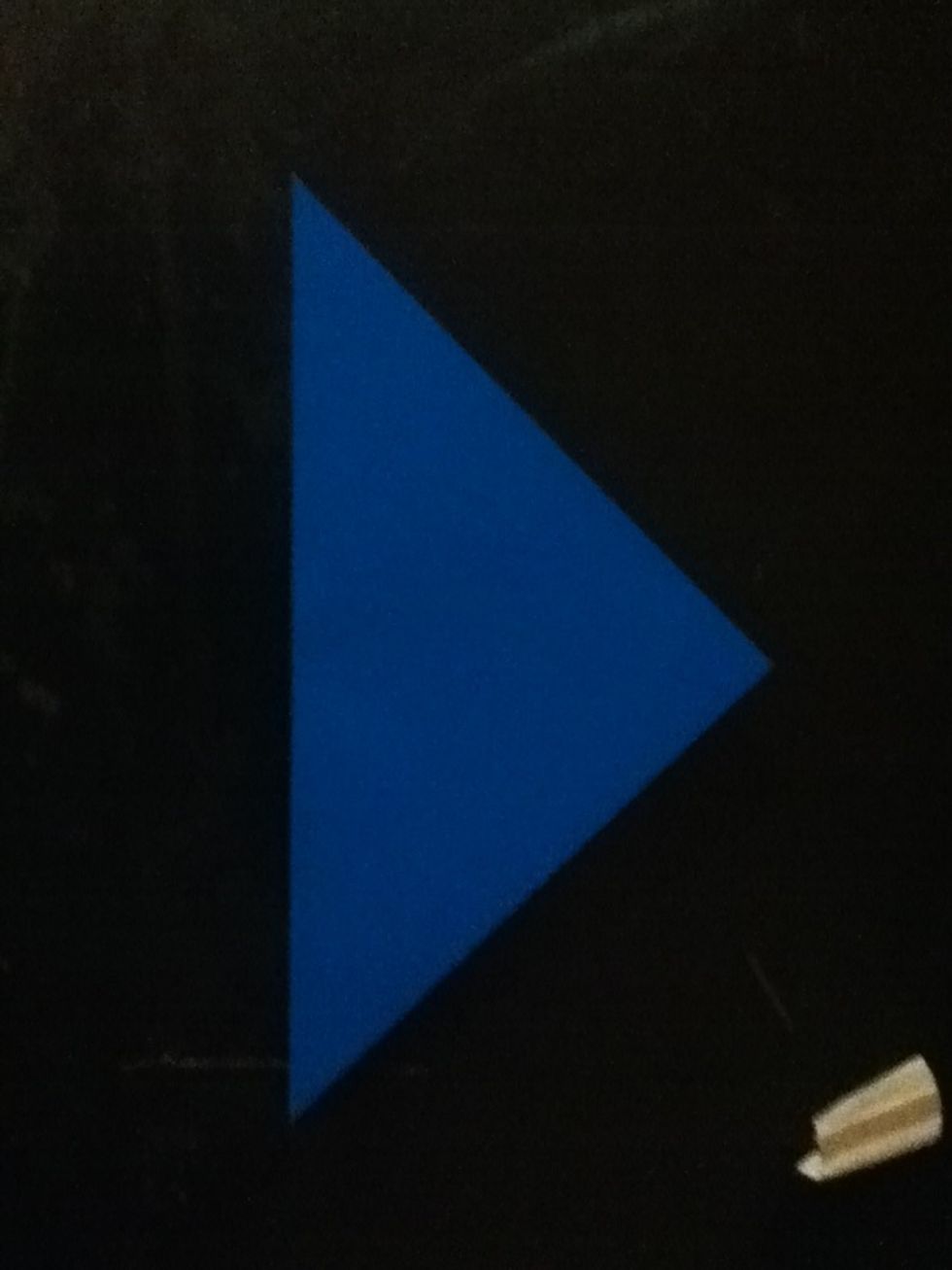Fold your paper in half so it forms a triangle.