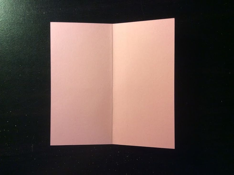 Fold your paper in half.