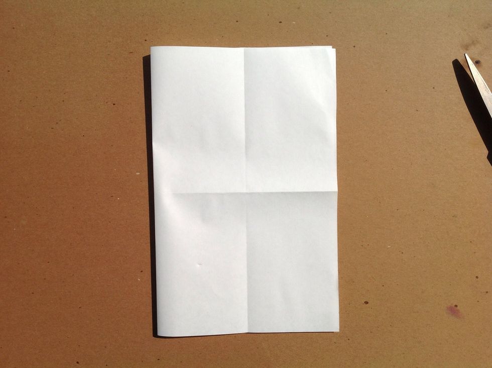 Fold your paper into a book fold from left to right.