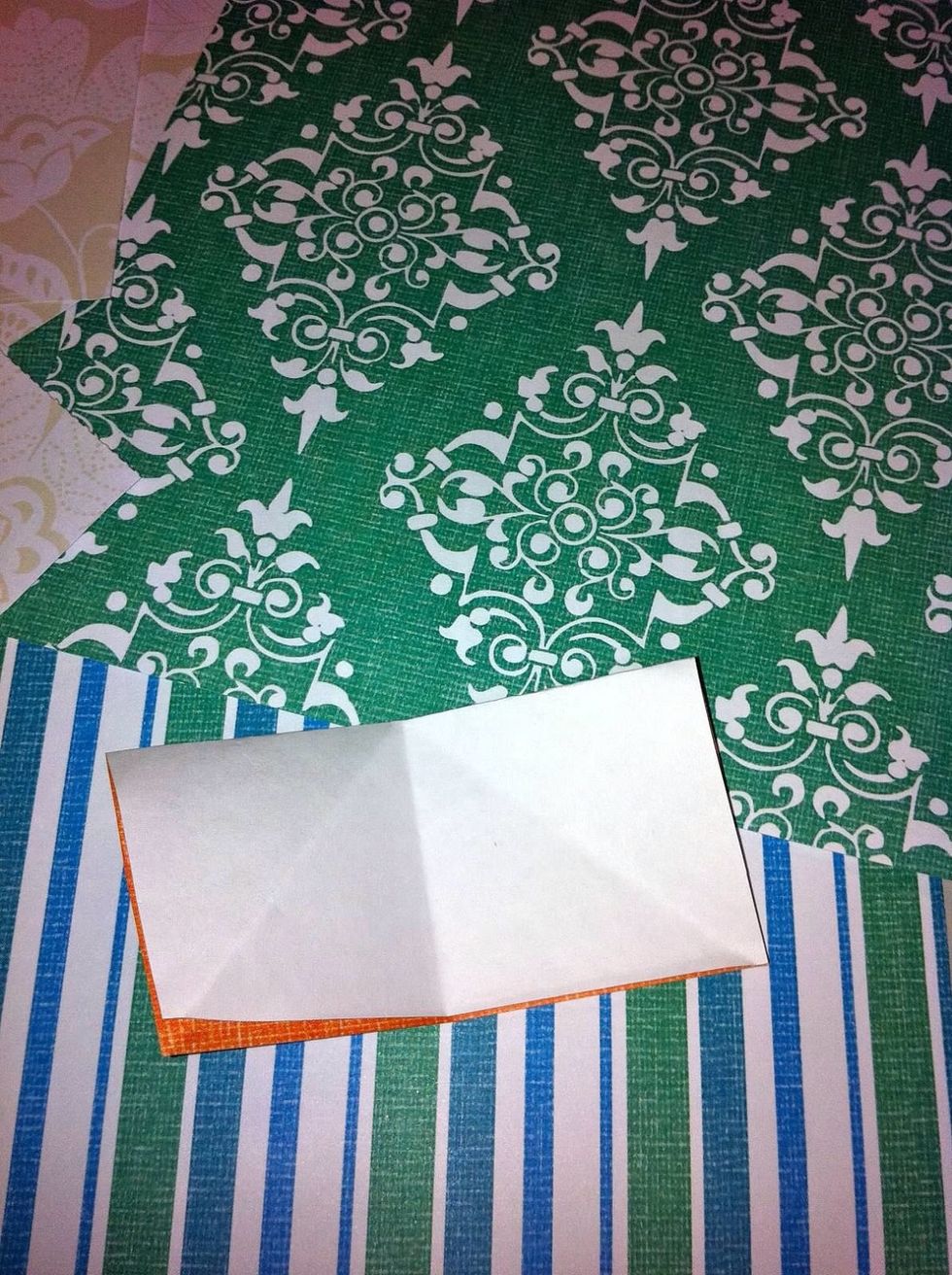 Fold your small square in half with the printed side in.