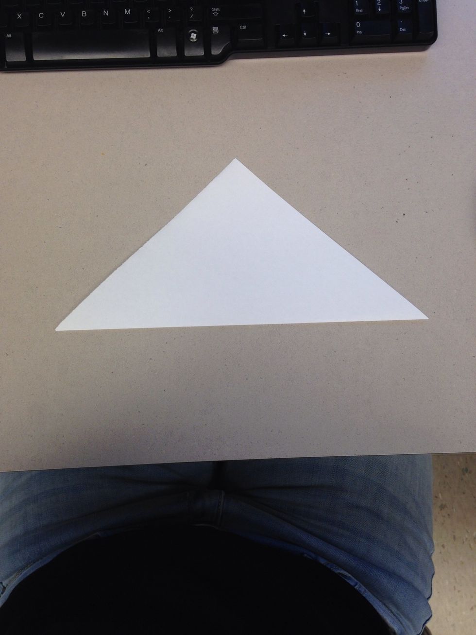 Fold your square piece of paper Into a triangle.