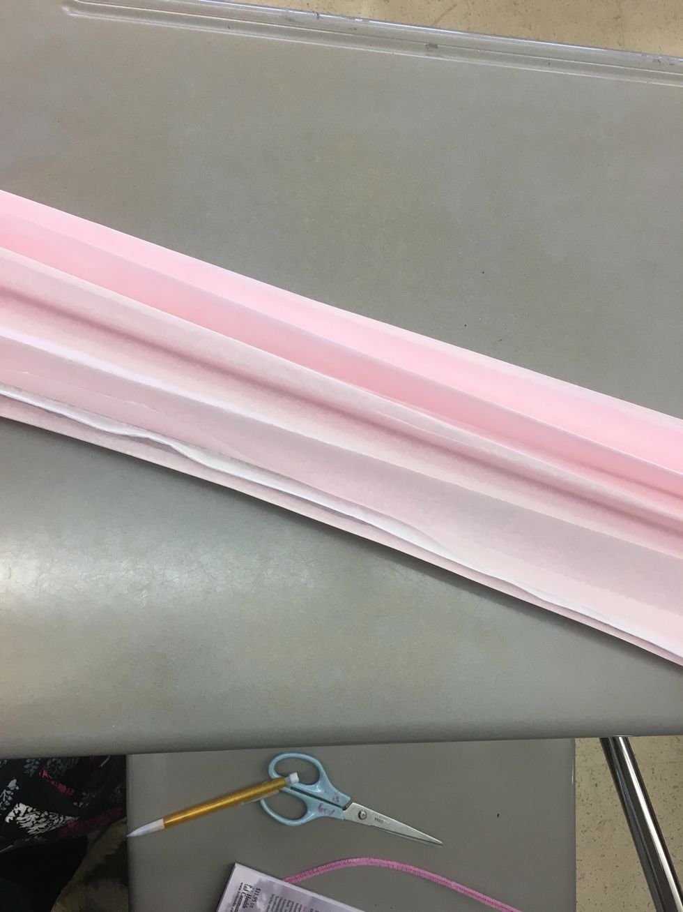 Fold your tissue paper back and forth like your making a fan