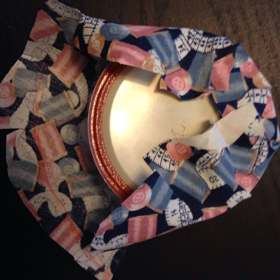 Follow around the lid, gluing one section at a time to keep the top tight but fluffy