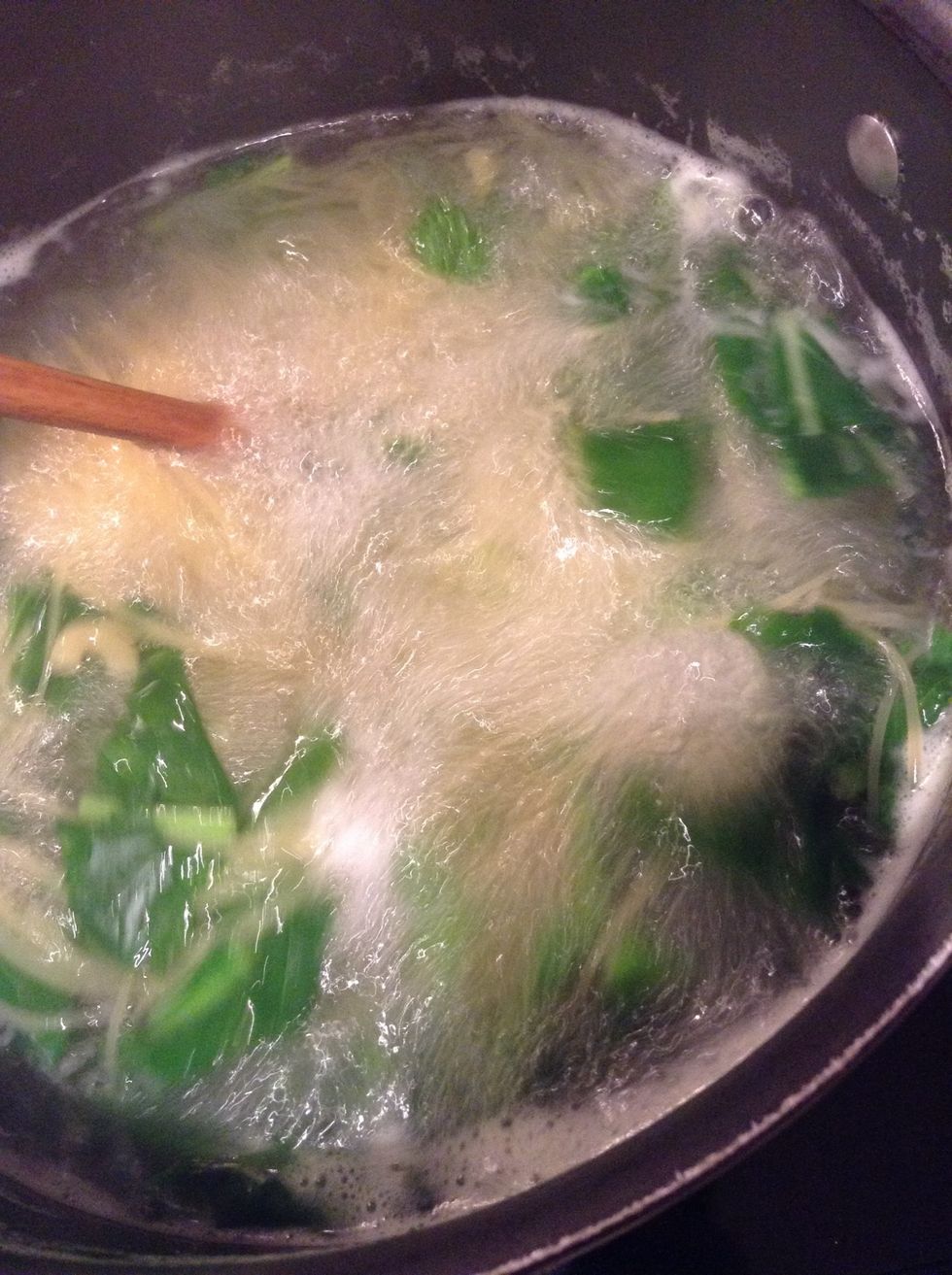 Follow directions on pasta box and boil. When there's 5 minutes left, add the broccoli rabe.