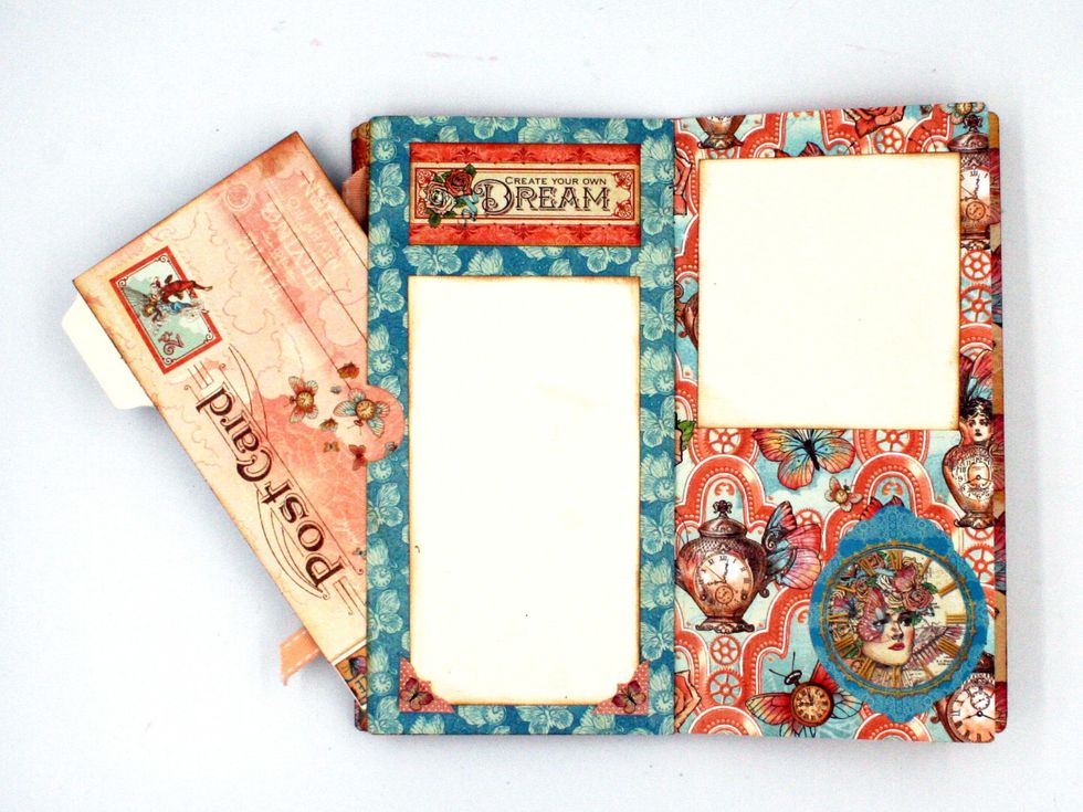 Follow steps 33-34 to create a file folder for the pocket.  For the right side page, add a 3 1/4 x 3 1/2" photo mat at the top.  Place a sticker as shown at the bottom.