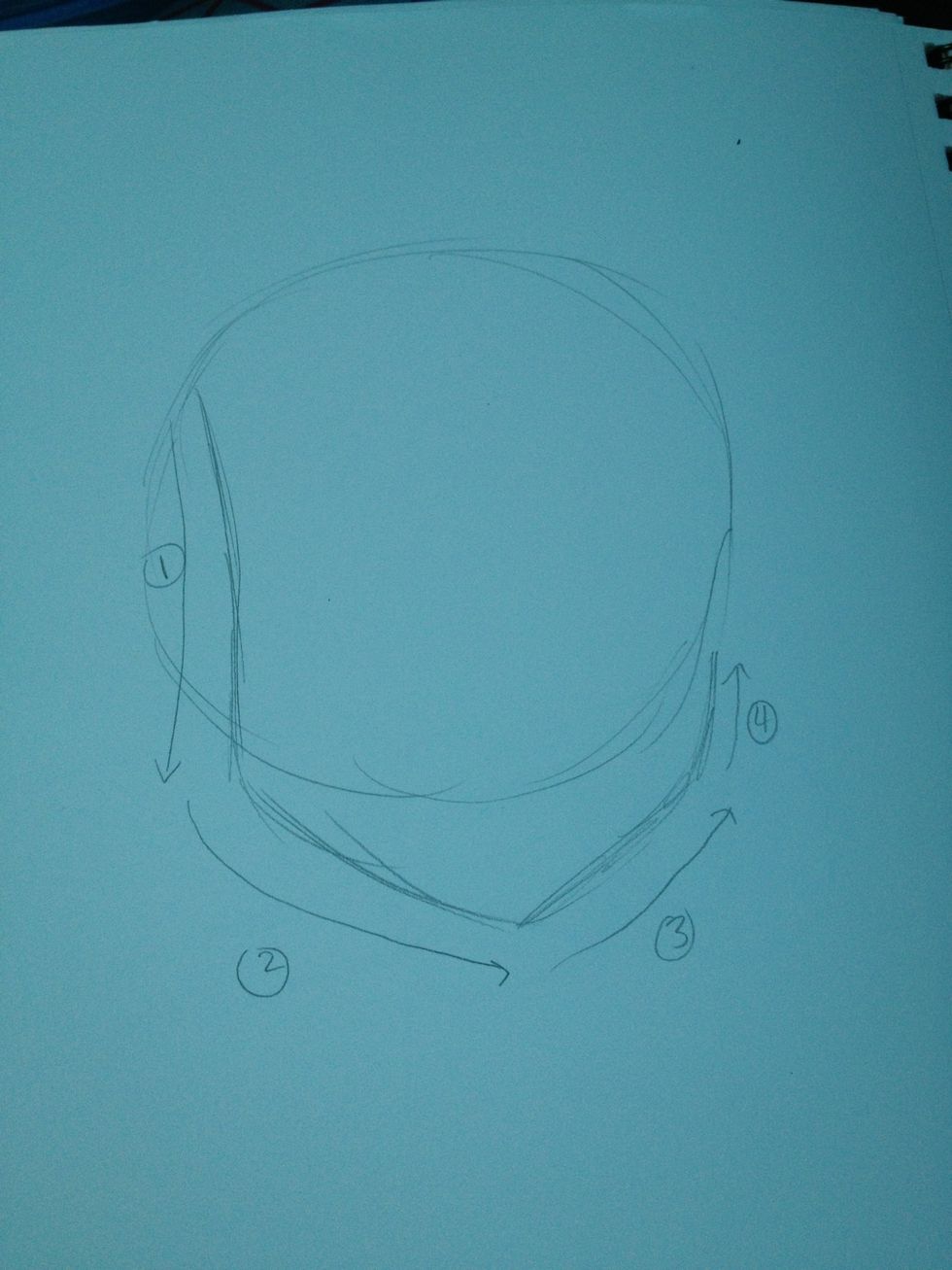 Follow the lines and draw the face shape. Depending on what kind of jawline you want your guy to have, you curve the lines or make them more straight.
