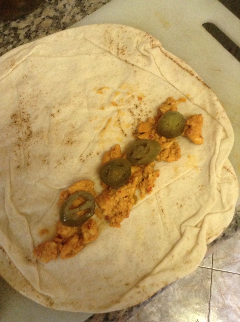 Follow the order , put the Arab bread and put chicken tikka add layer of jalape\u00f1o