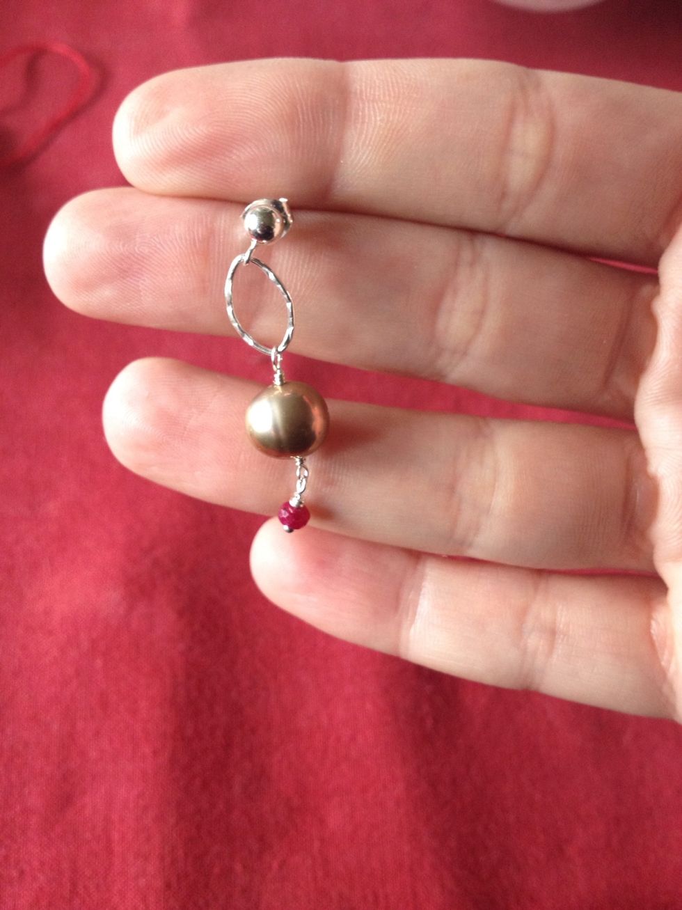 Follow the wire wrap step to link the ruby drop. Because of the head pin, you will not need to wrap the bottom.