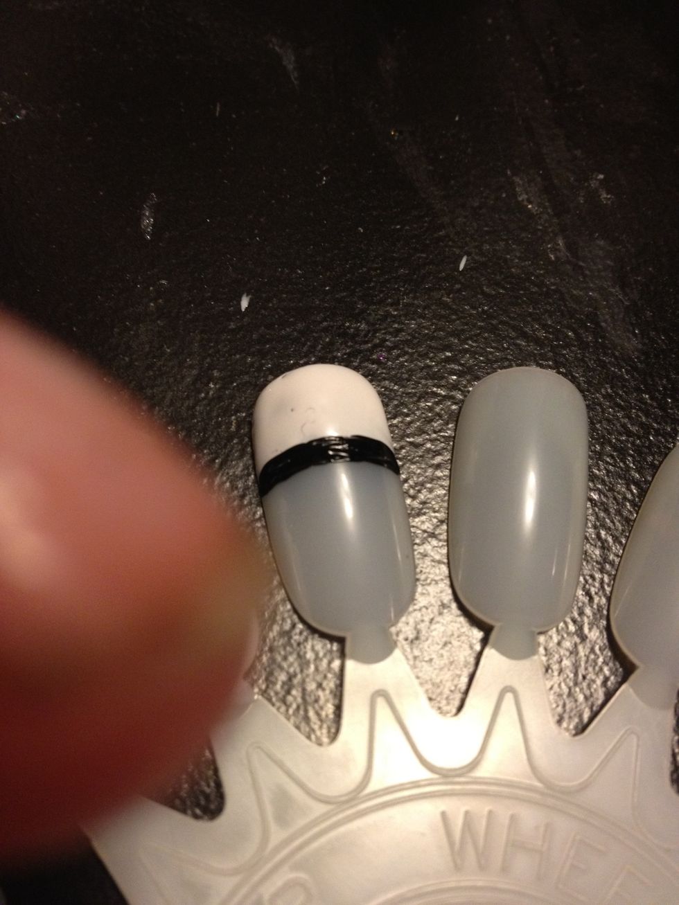 Followed by a black stripe underneath.