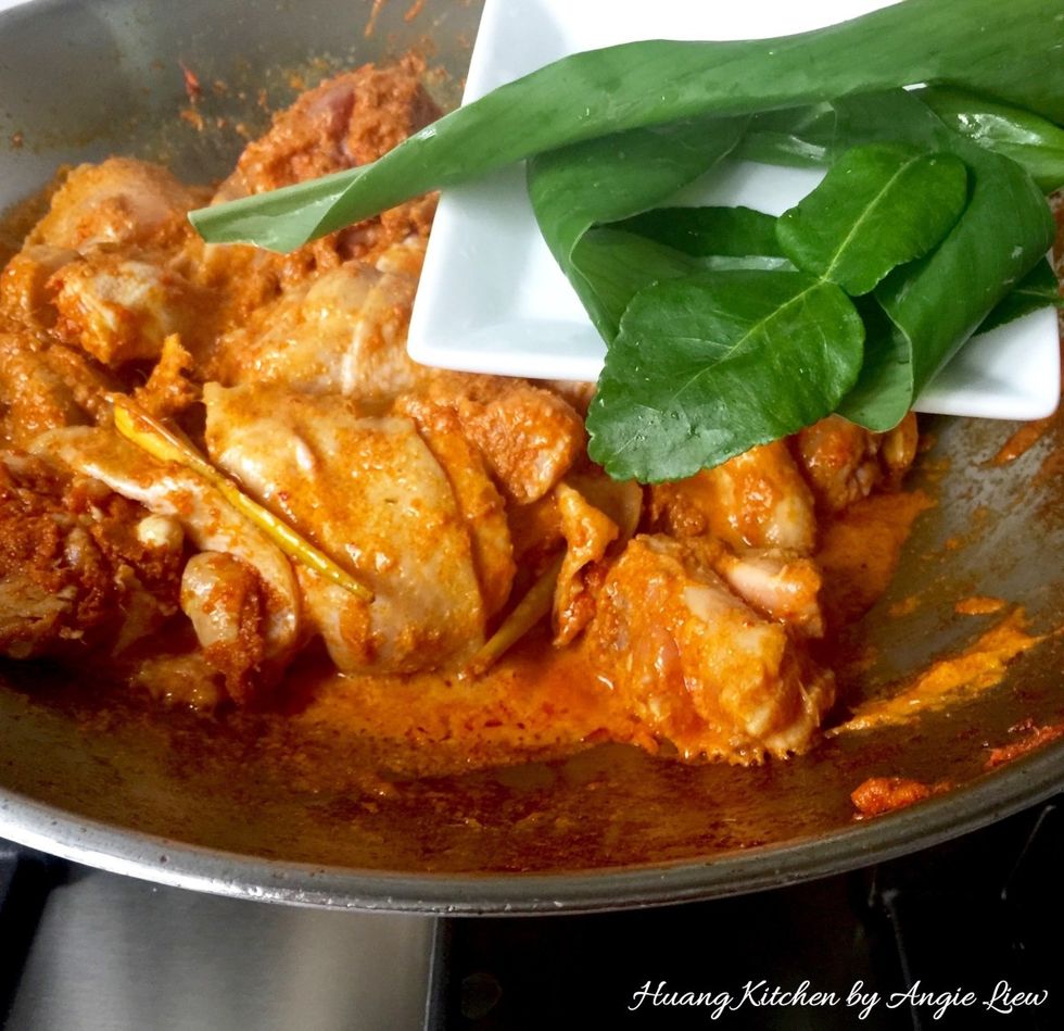 Followed by the crushed kaffir and turmeric leaves.