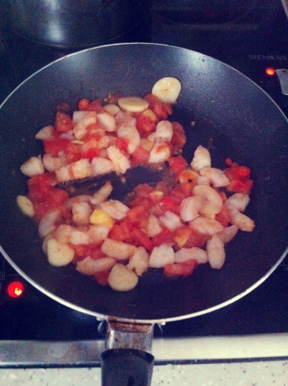 Followed by the shrimps, season with salt & pepper to taste.