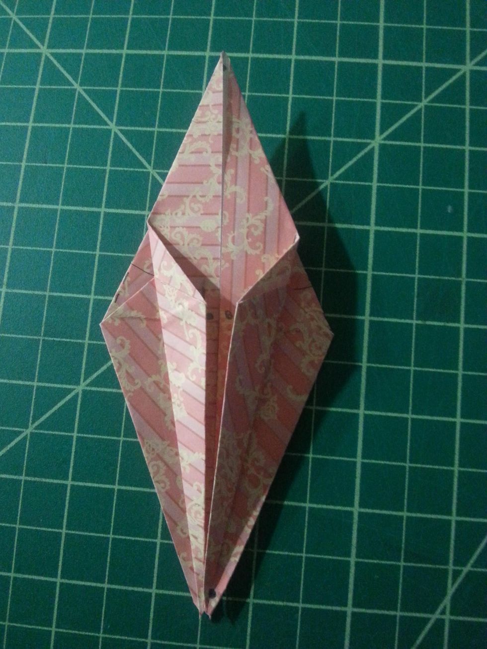 Following step #16, your shape should look like mine on the left.