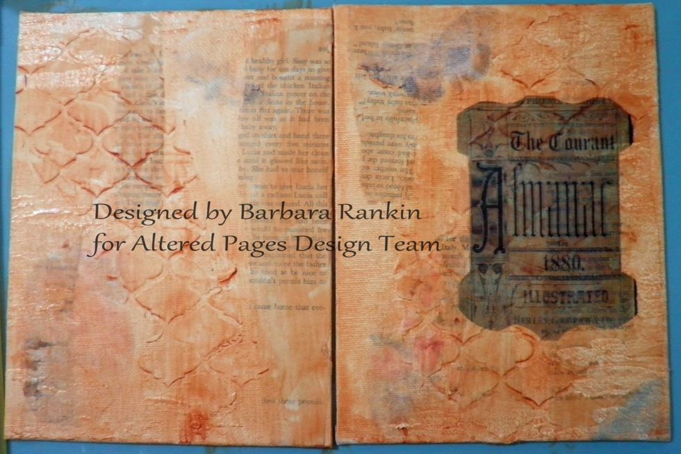 Following the CA package directions, I adhered my trimmed "Almanac" image to the cover, using a glue stick.