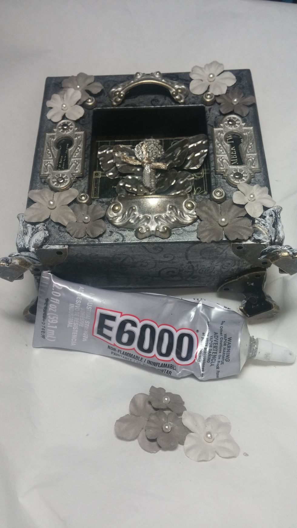 For a bit of softness I added some flowers by Prima.