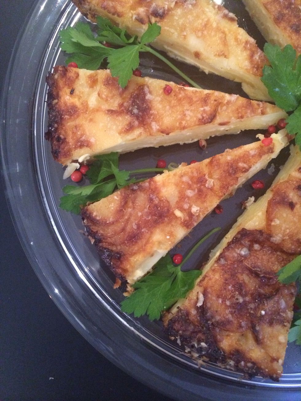 For a formal dinner I pre- cut the potato cake. Easier and quicker to serve. Heat it in the microwave just before eating