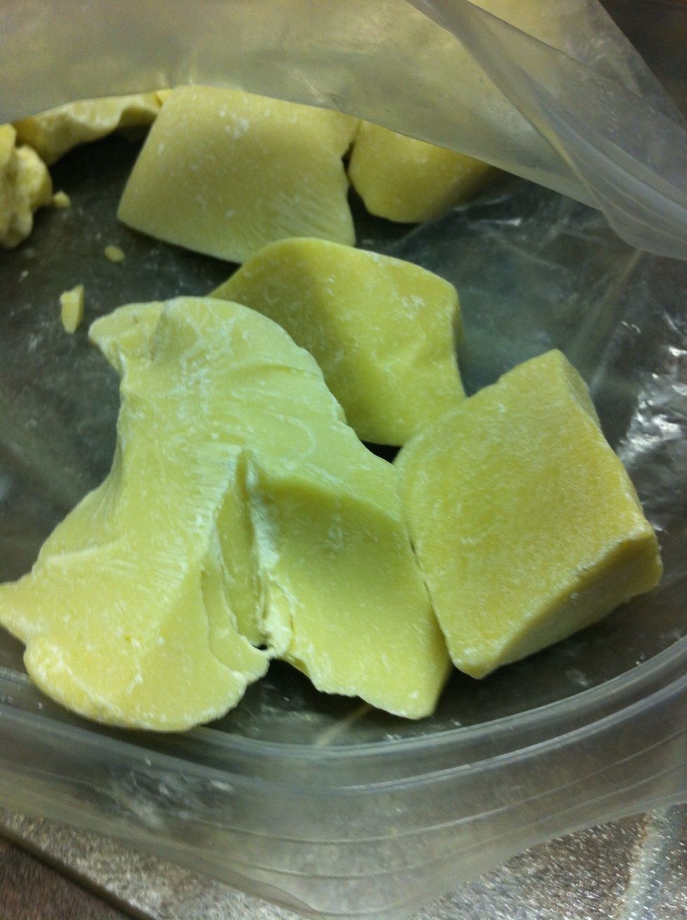 For a harder and medium greasiness bar, try cocoa butter. It is an approved barrier ingredient and occlusive, so it's a great choice if you want skin protection and moisturization.