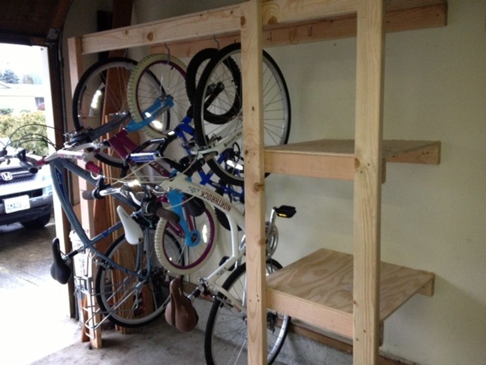 For a total of $119 at Home Depot we were able to build 2 custom shelves perfect for the garage and the bikes. Just to put this in perspective. A garage shelf at Costco that is half the size is $129.