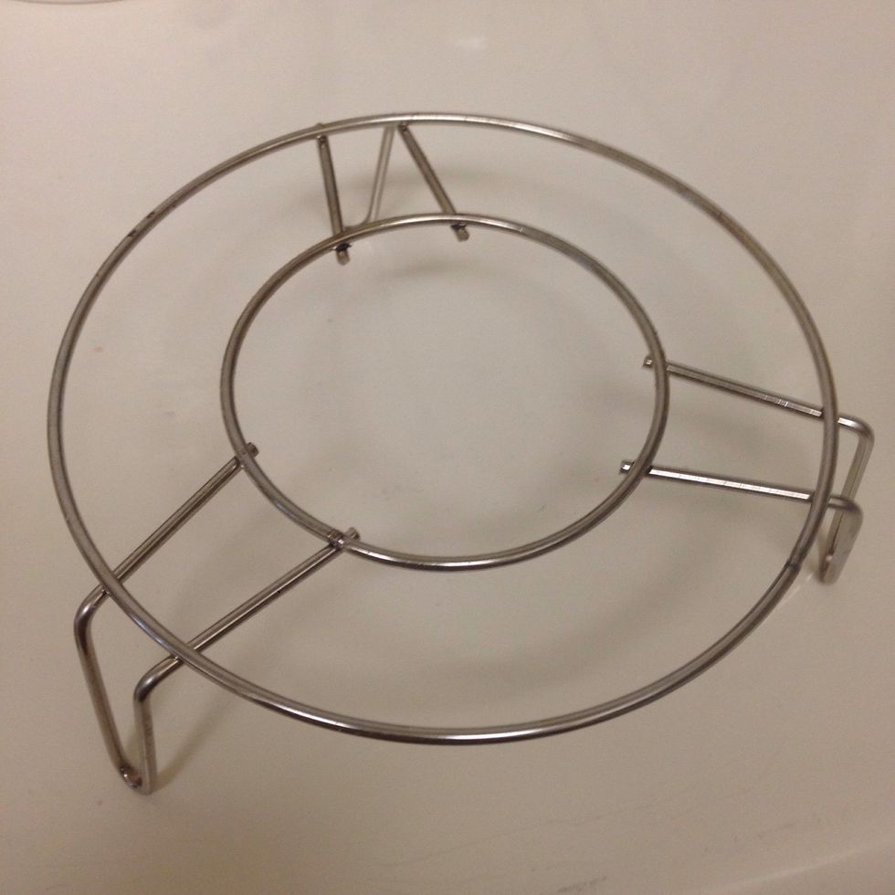 For an easy, faster, and excellent results you'll need this kind of metal steaming rack. I found it at an Asian / Chinese supermarket.