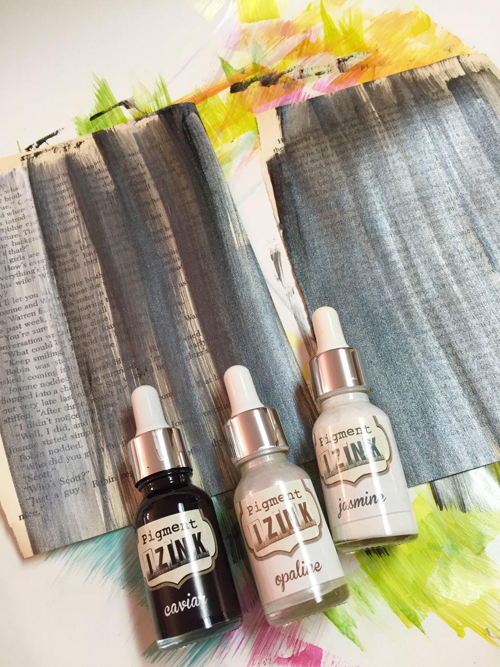 for background and accents, paint a few pages using Caviar, then lighten 1 page with Opaline and 1 using Jasmine.