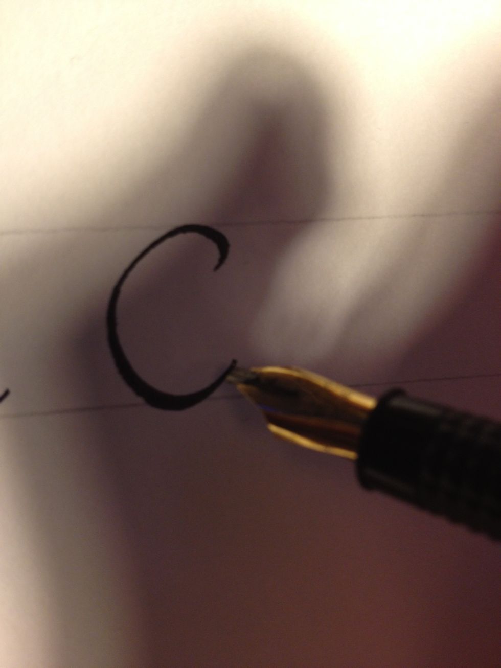 For "e", start out by making a letter "c".