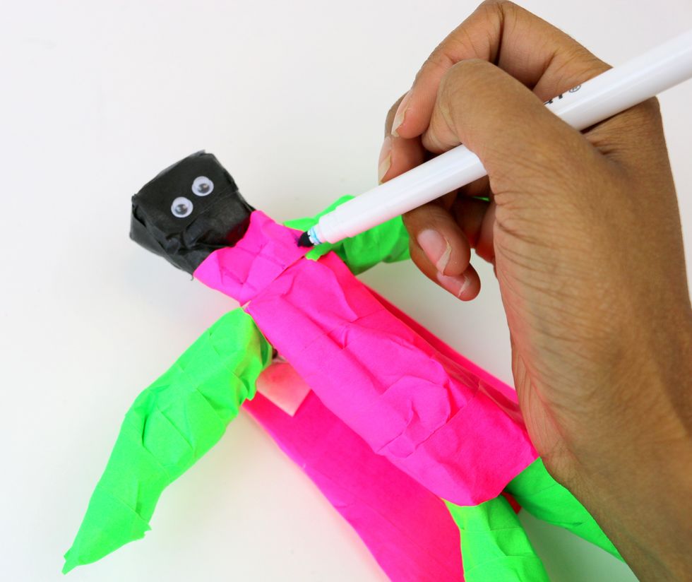 For finishing touches, draw some designs.