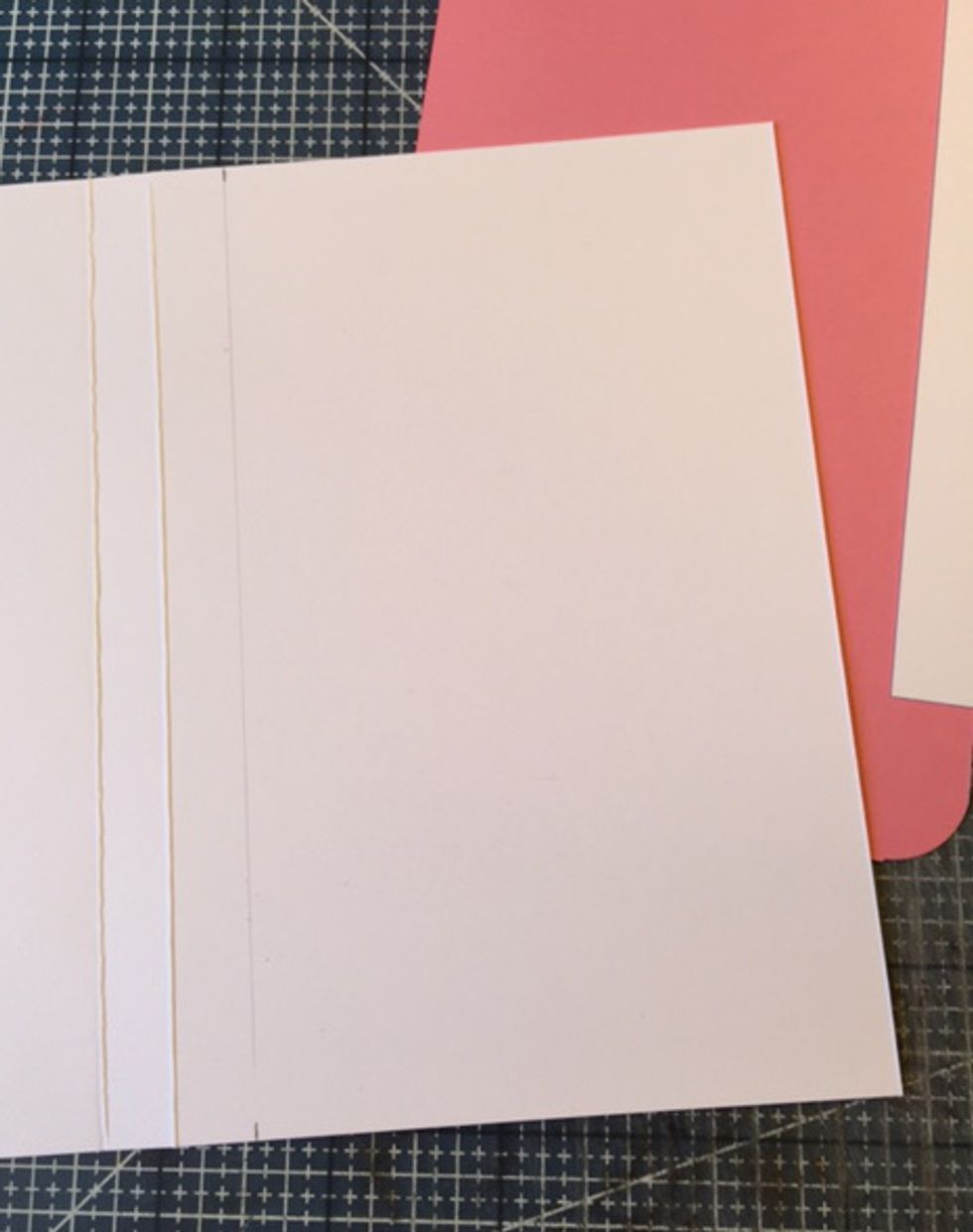 For left flap, mark a line 1/2" from fold on one side.