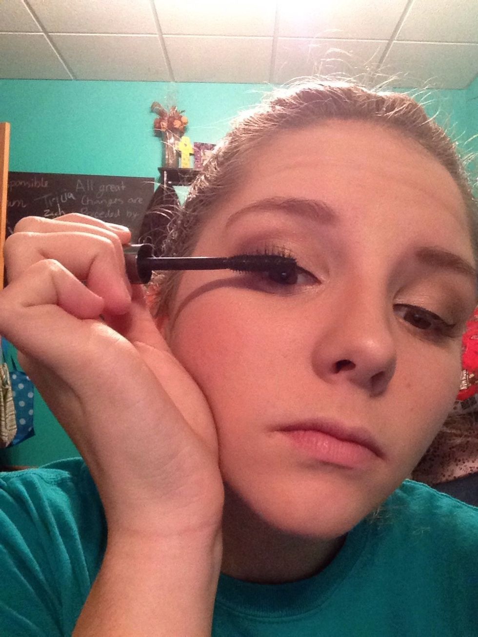 For mascara, carefully run the wand through your lashes in a back and forth motion. Repeat however many times it take to get desired length and volume.