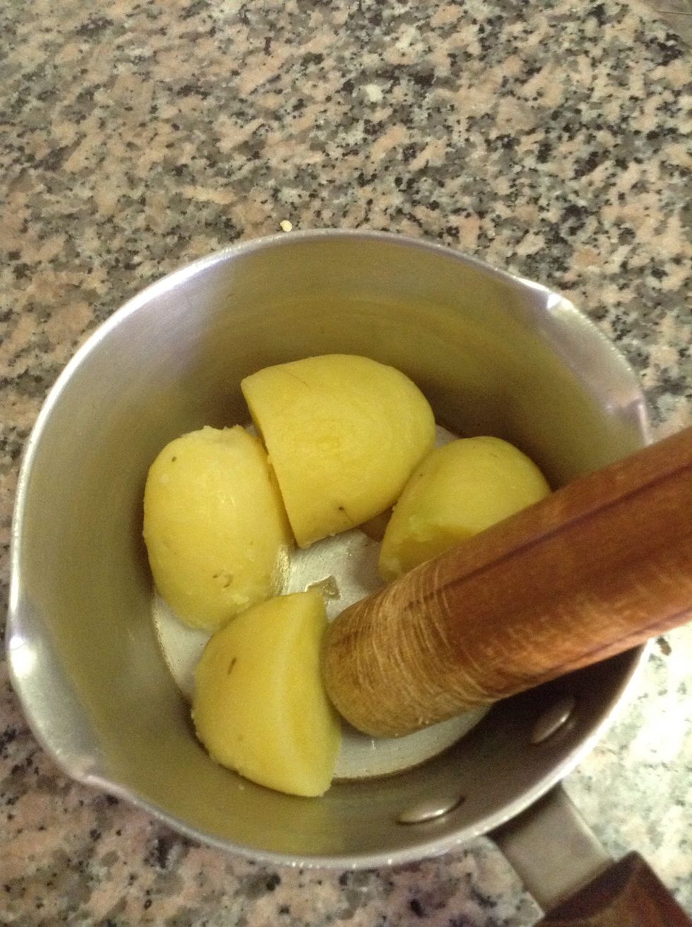 For mashed potato gravy , take 2 large potatoes and boil and peel them