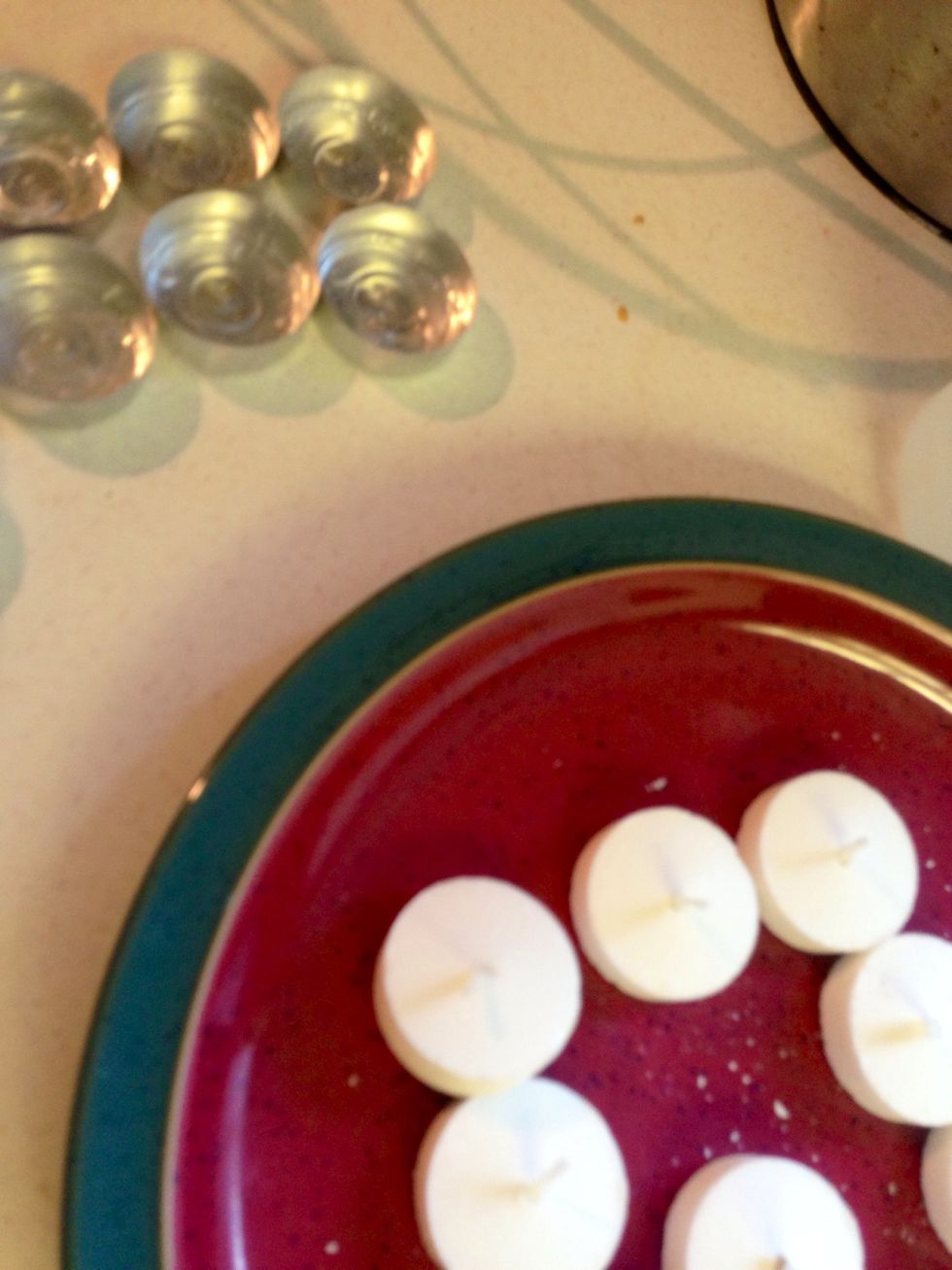 For molds, I used tea light candle tins. Remove tea lights by gently pulling on their wick.