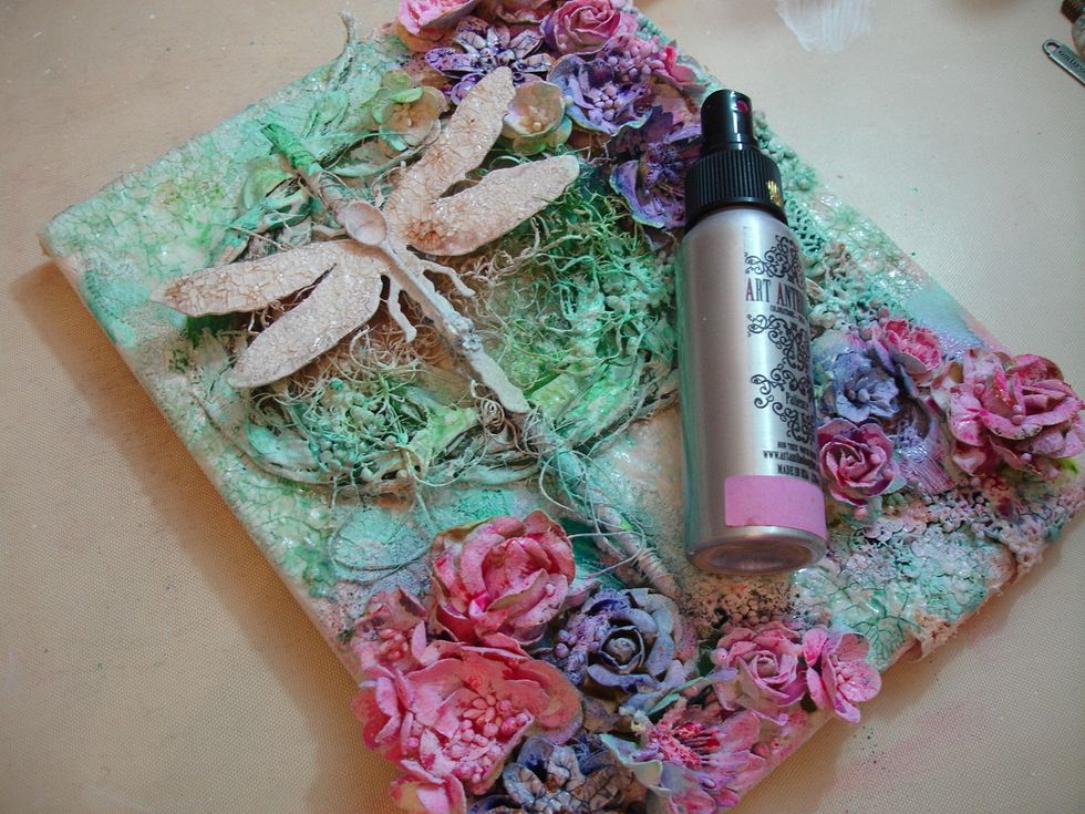 For more pops of color I sprayed Patience Colorations to some flowers and then heat dried it with my heat tool.