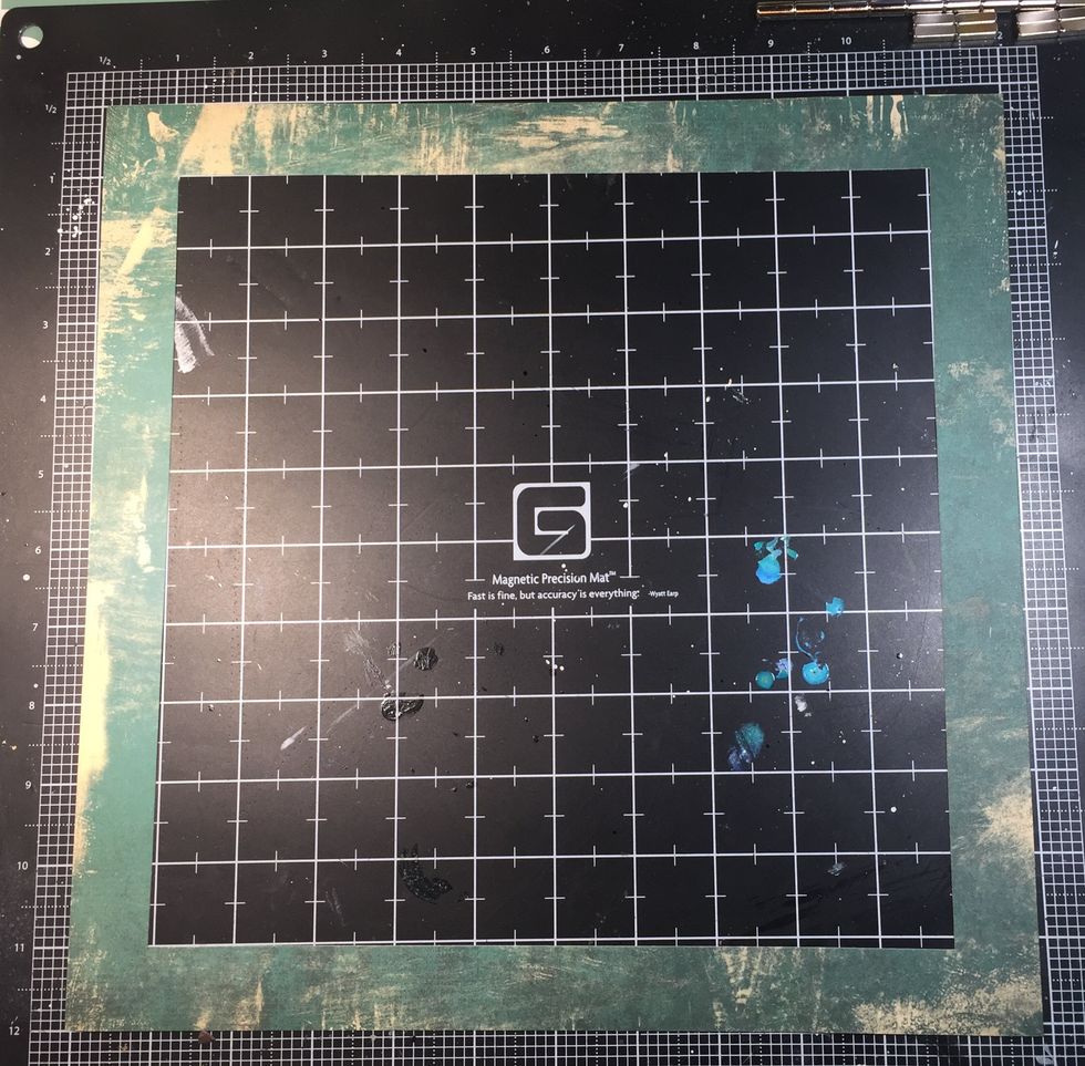 For my background layers, started with this piece of paper that I "gutted." I cut out a ten-inch square from the middle. This is a great way to get the most out of your patterned paper!