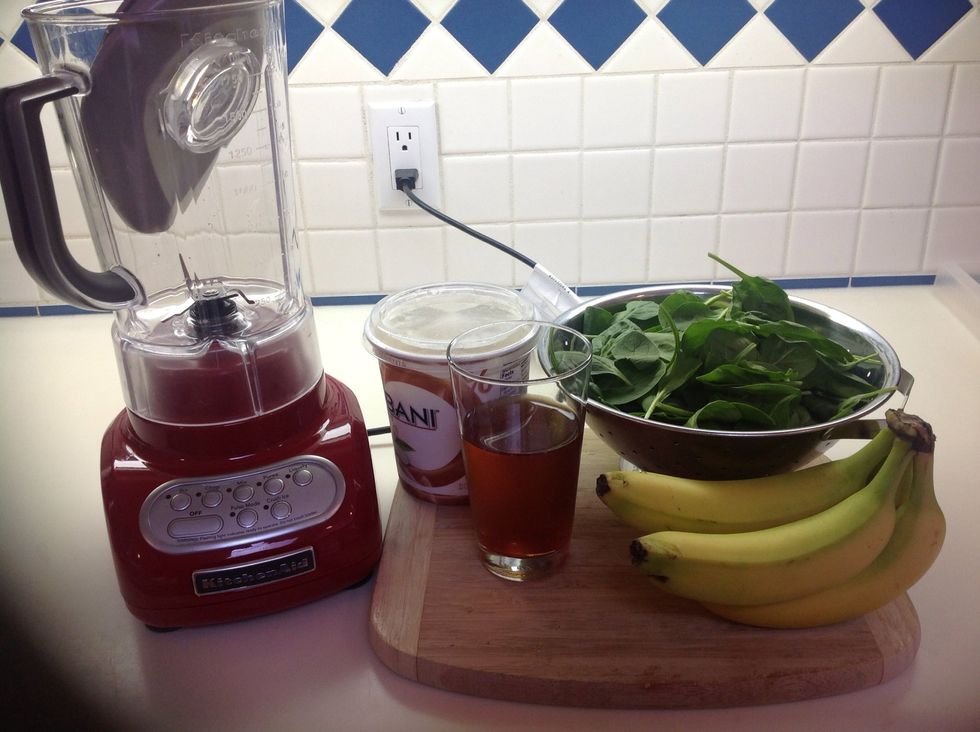 For my basic smoothie recipe you just need bananas, non-fat vanilla Greek yogurt, fruit juice, and some spinach. From there you can vary it any way you like - more on that in a minute!