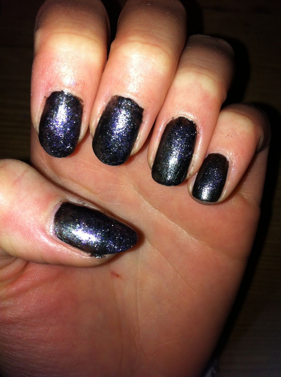 For my nails I used several colors: green, pink, purple and blue. You could also use only green and purple. Put some of the nail polish on the sponge and carefully pat it on your nails.