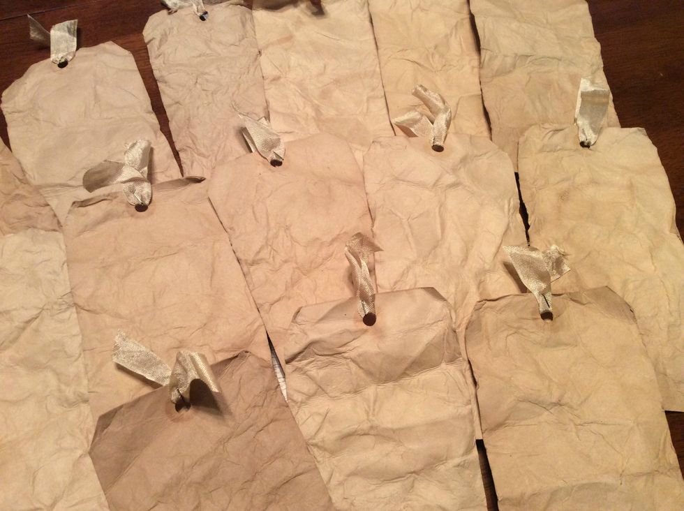 For my photo mats I used my tea stained manila tags. I also used the stain on my seam binding. The tutorial for this technique is here: https://snapguide.com/guides/make-grungy-tea-stained-tags/.....