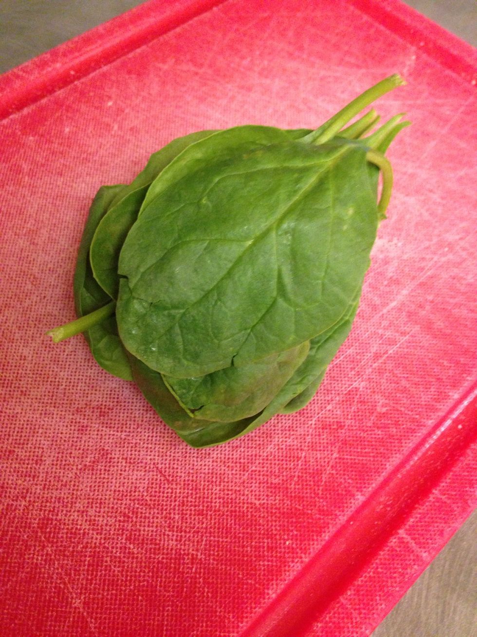 For my sauce I used cream, fresh spinach, dried herbs, & a little flour/water slurry to thicken it. First I stacked all the leaves like so...