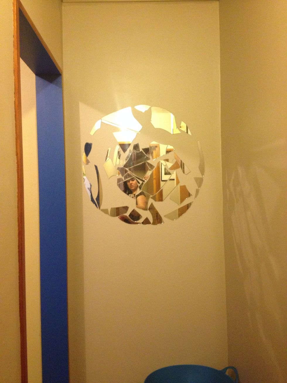 For my shape I picked a circle and sketched it lightly onto the wall. I just used blutack to attach the pieces to the wall. I began with the outer edge so finding pieces with curved edges.