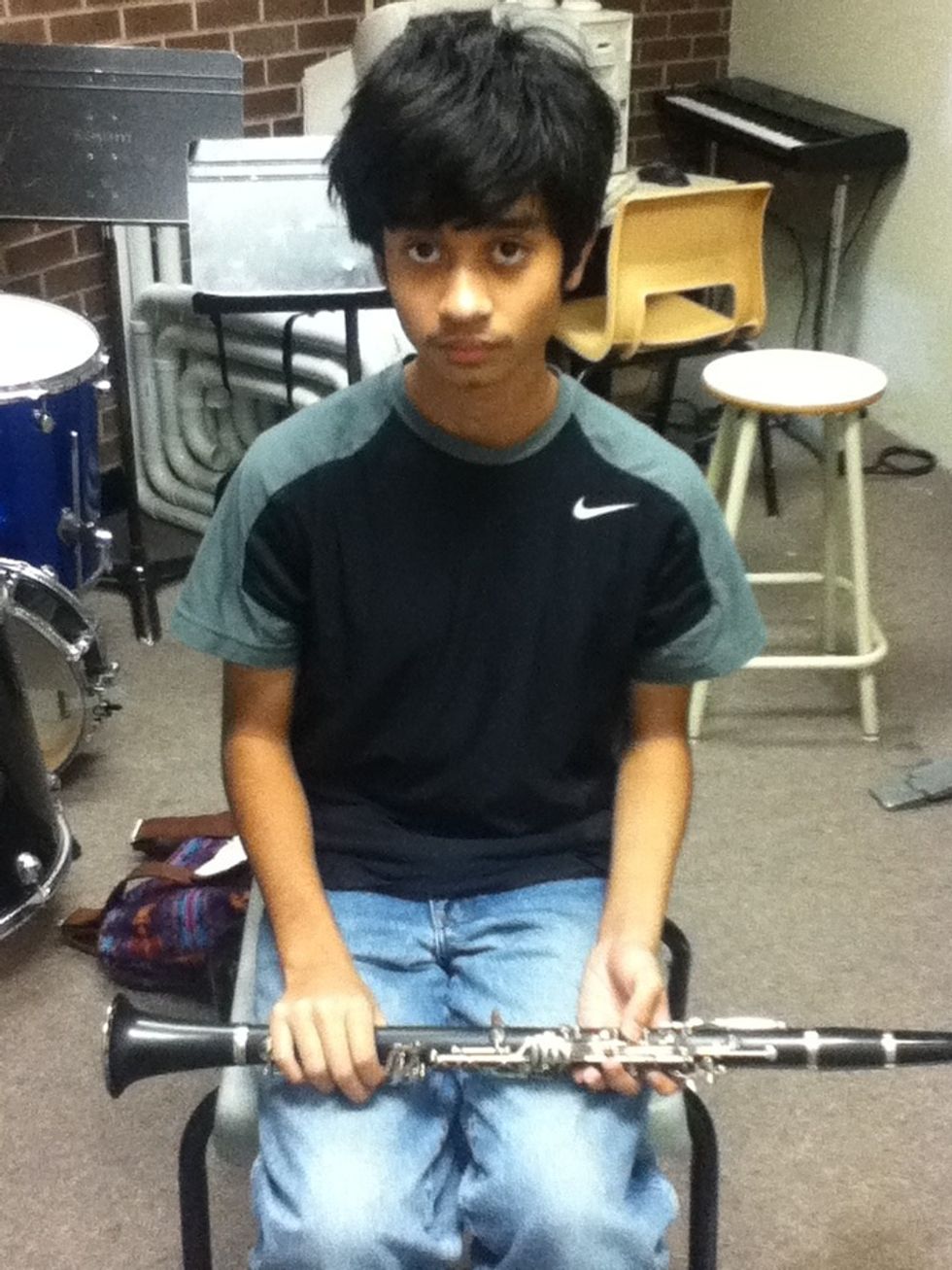 for posture, make sure to sit up straight, feets and legs straight, and not to lean against the chair. when ready, place the clarinet across your legs