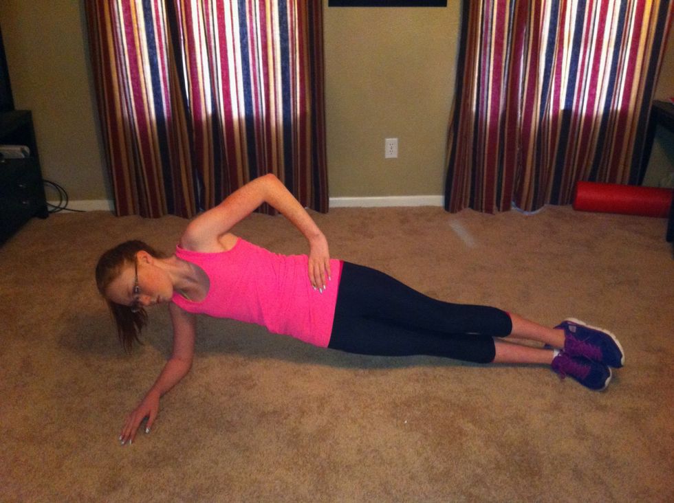 For side plank, lie on side and support upper body with forearm. Stack feet. Raise hips off floor keeping back straight and hold for  5 counts. Repeat 5 times. Change sides and repeat.