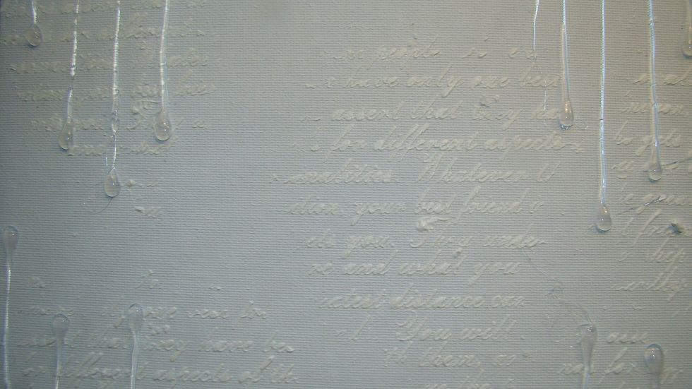 For some fun interesting texture I dripped hot glue on the canvas and allowed to dry.