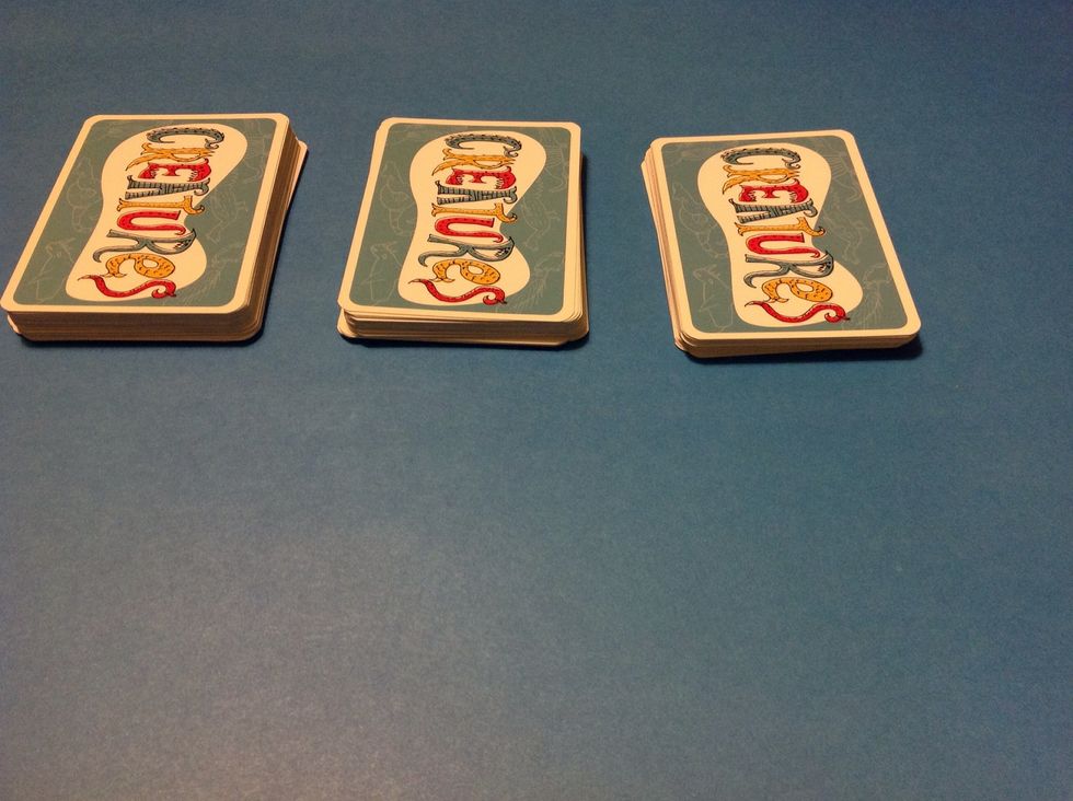 For some learners, it may be necessary to split the deck into three piles (fronts, middles, and backs,) so that your learner can more easily make creatures.
