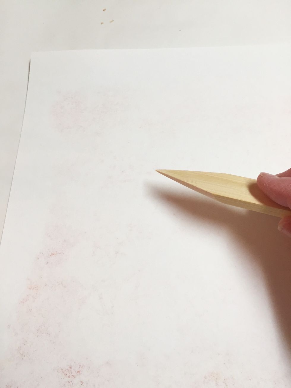 for stencils with small areas, like the parasol stencil, you may need to go over paper using bone folder to impress finer details in paper. you can check transfer by gently lifting corner of paper.